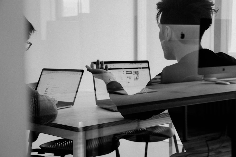 Customer support specialist at a desk with headset